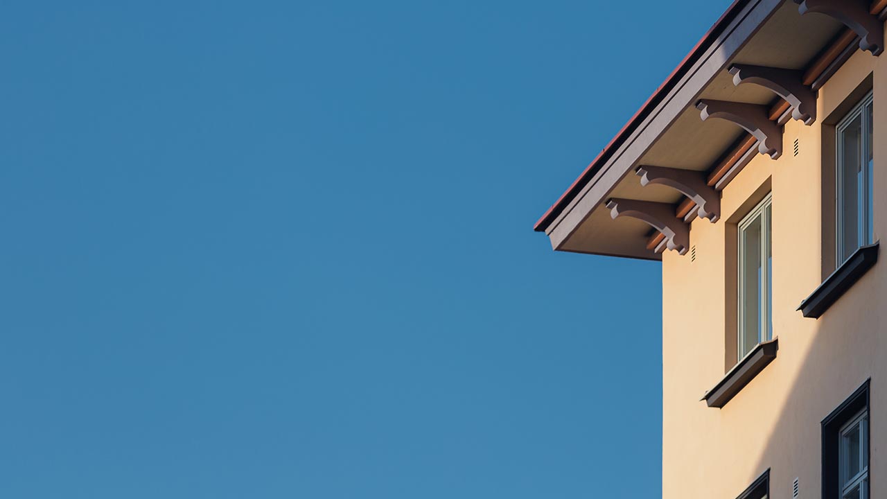 Small triangular house by the water